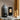 black ceramic oil diffuser with bath soak and natural essential oils next to it